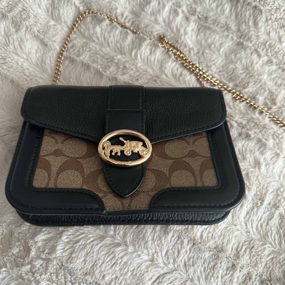 Small two tone Coach night bag with gold chain.  Brand new/never used.